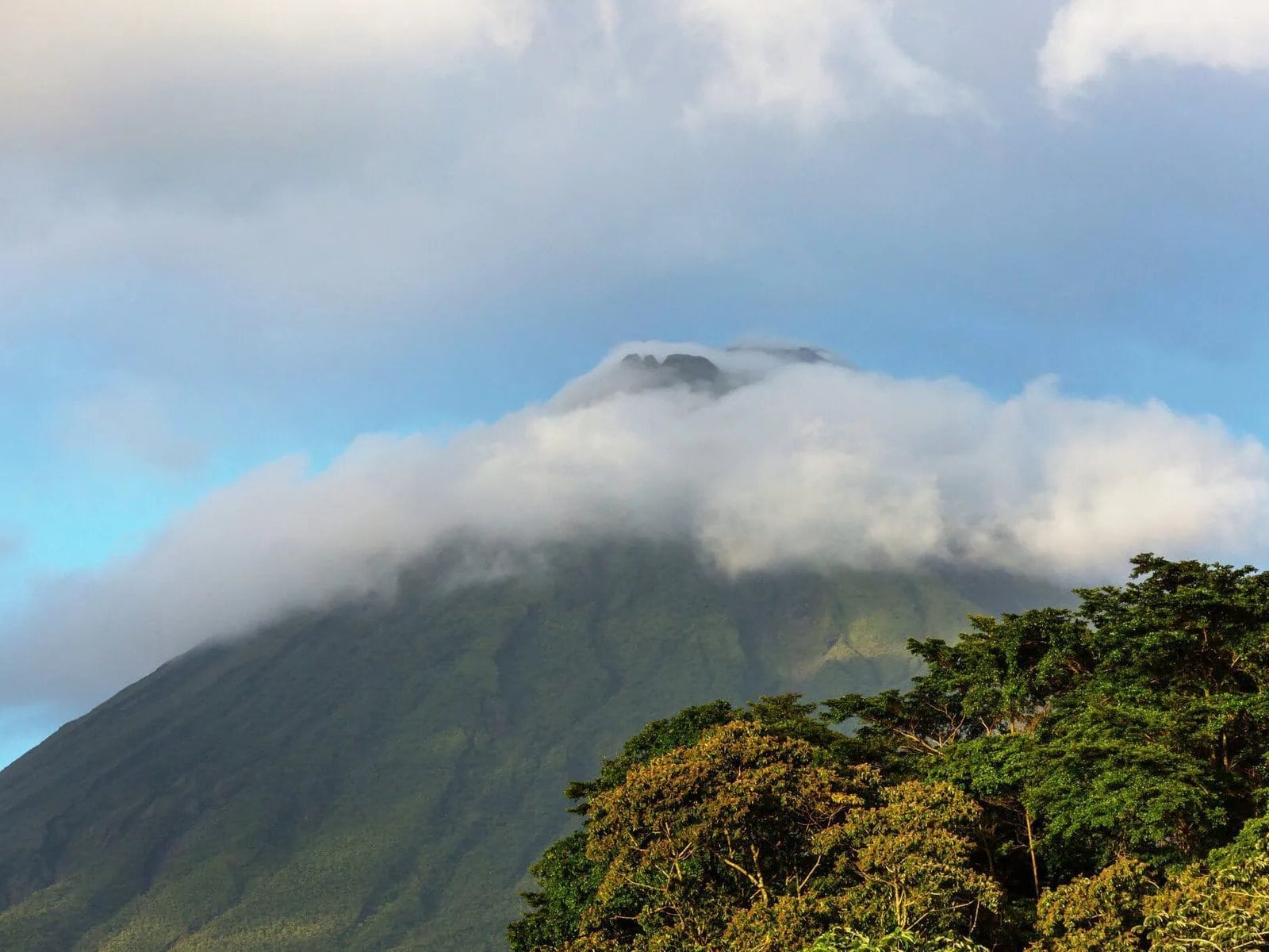 Arenal Volcano rising above the rainforest in La Fortuna, Costa Rica